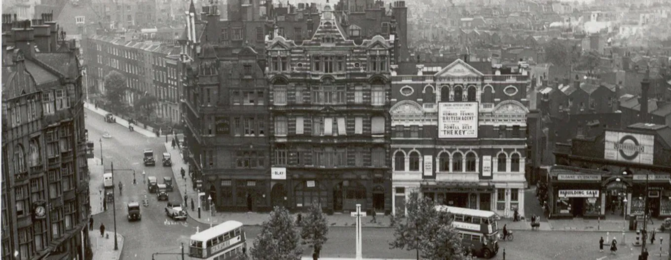 Historic Chelsea town center conveying early 20th-century civic life and transportation.