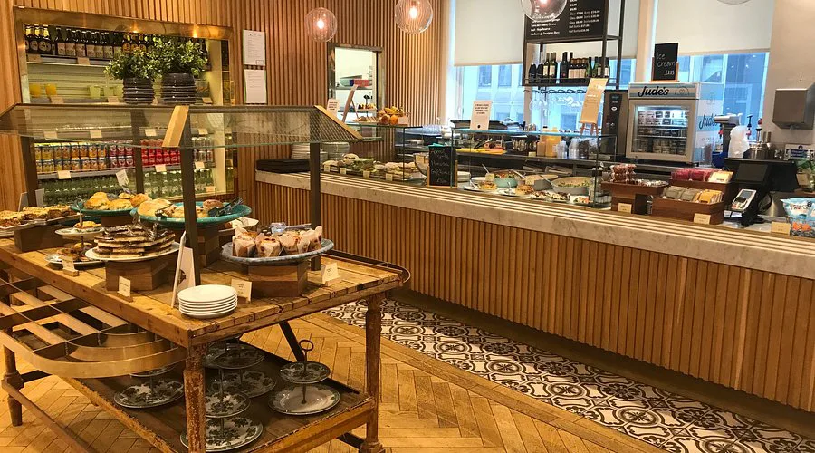 Benugo Café interior with a grab-and-go pastry and sandwich counter