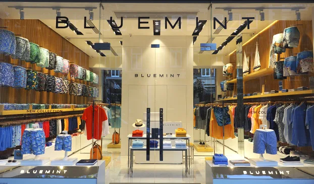 Bluemint storefront with window display for a clothing and accessories shop.