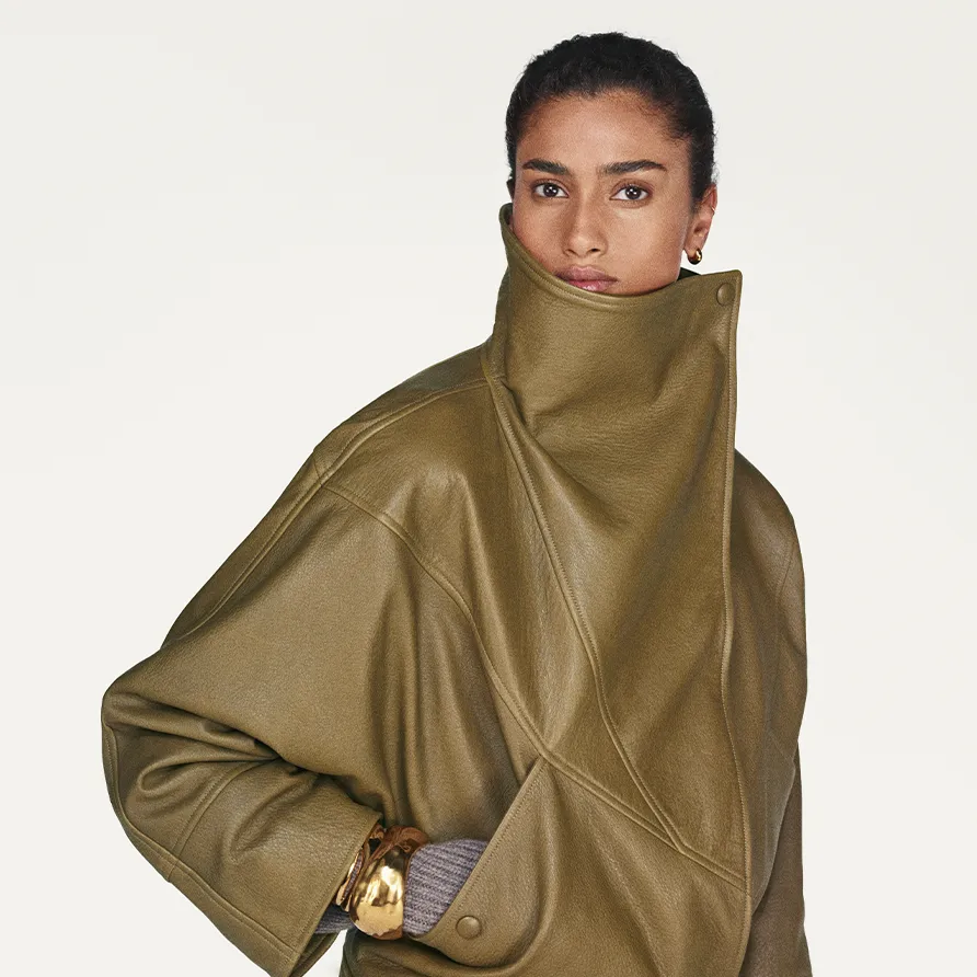 Sézane Jule leather jacket on a model with a high funnel collar