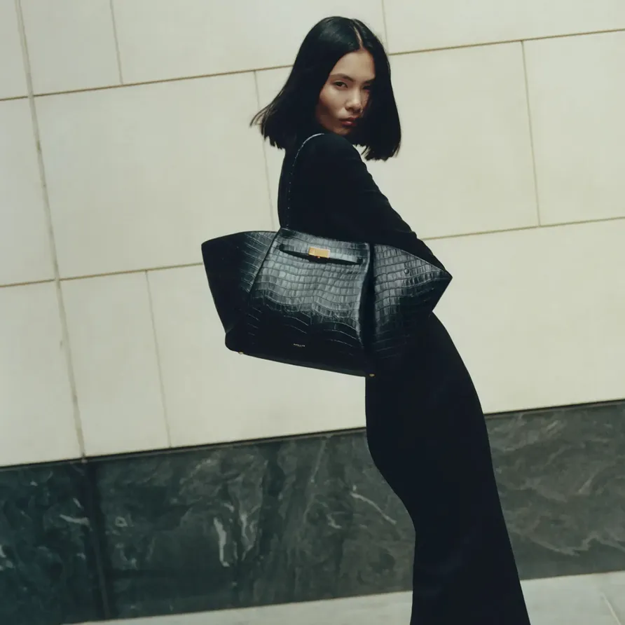 DeMellier tote bag modeled as a luxury everyday carryall