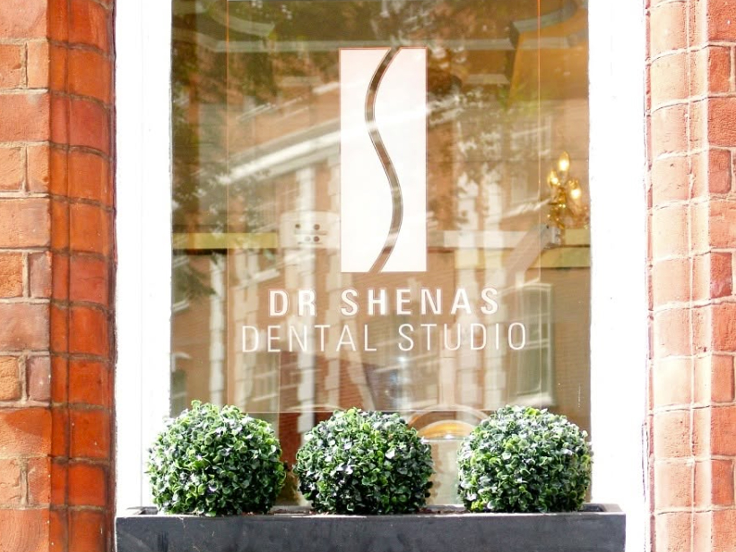 Dr Shenas Dental Studio storefront sign