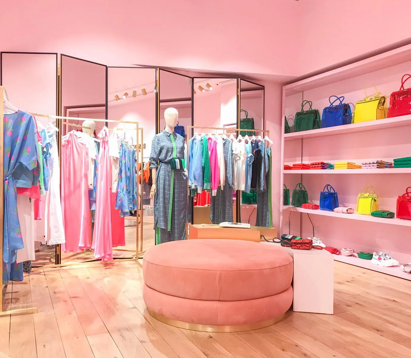Essentiel Antwerp boutique interior for women's fashion retail.
