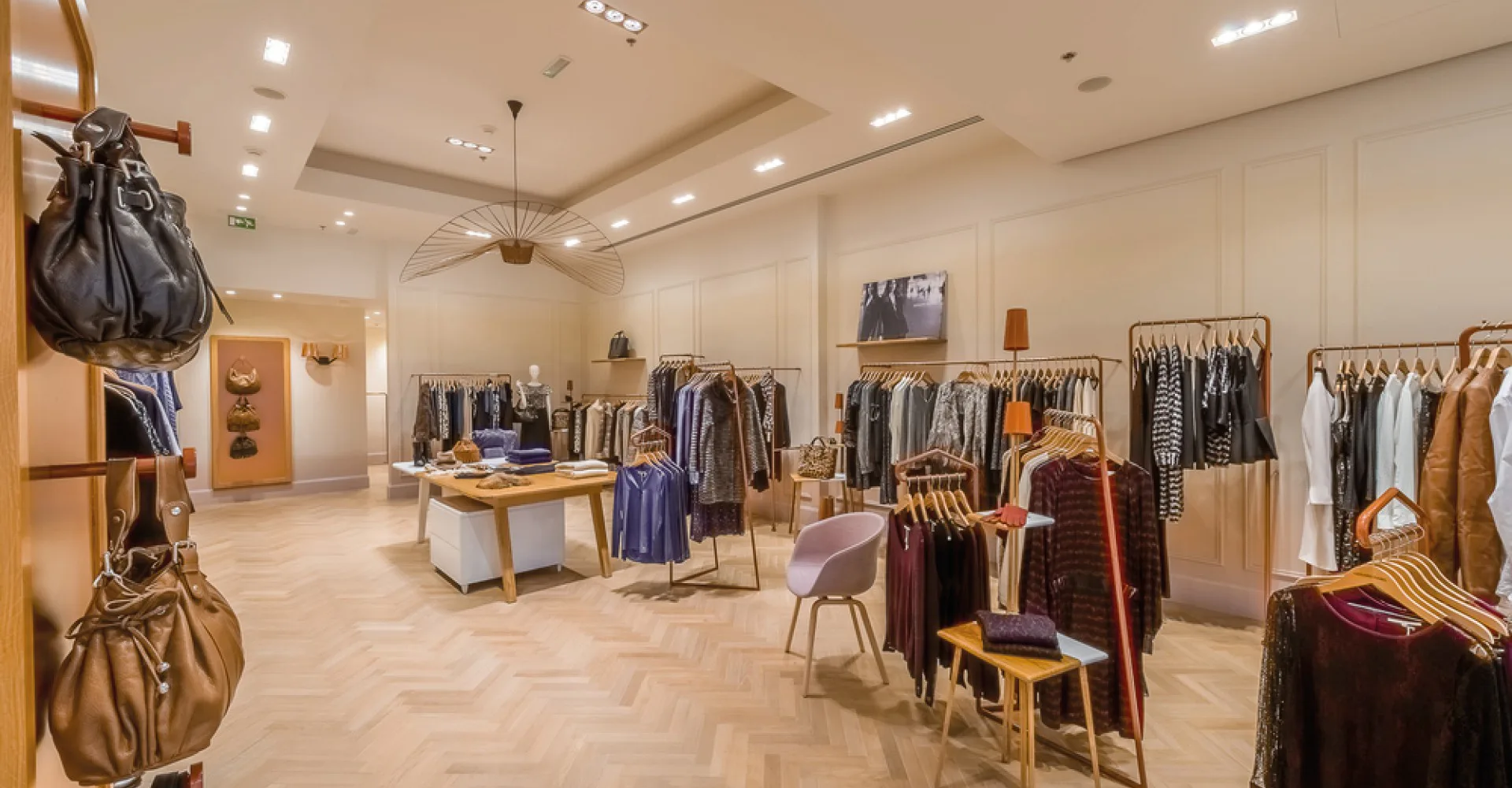 Gerard Darel boutique interior presenting women's clothing and accessories for shopping.