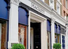 Hackett menswear storefront on a Chelsea shopping street