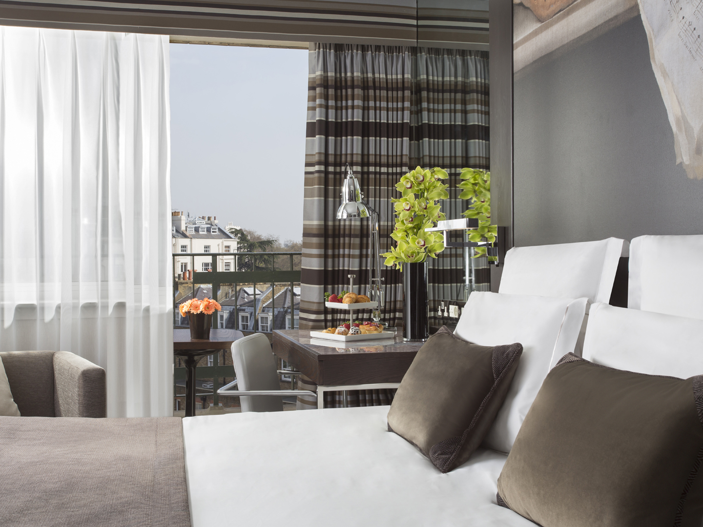 Hotel room at Jumeirah Lowndes Hotel with balcony overlooking the neighborhood
