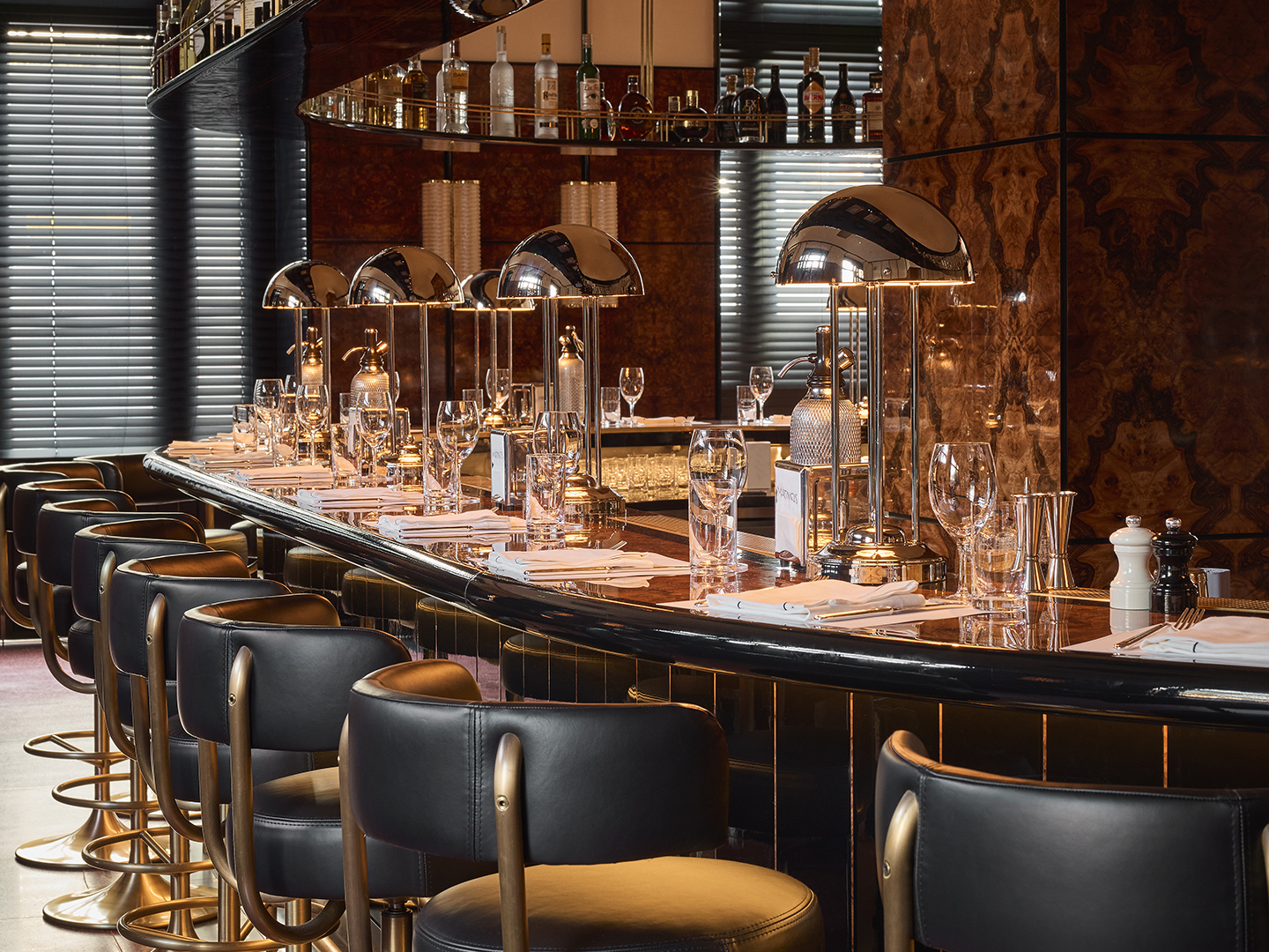 Martino's upscale bar counter prepared for dining service.