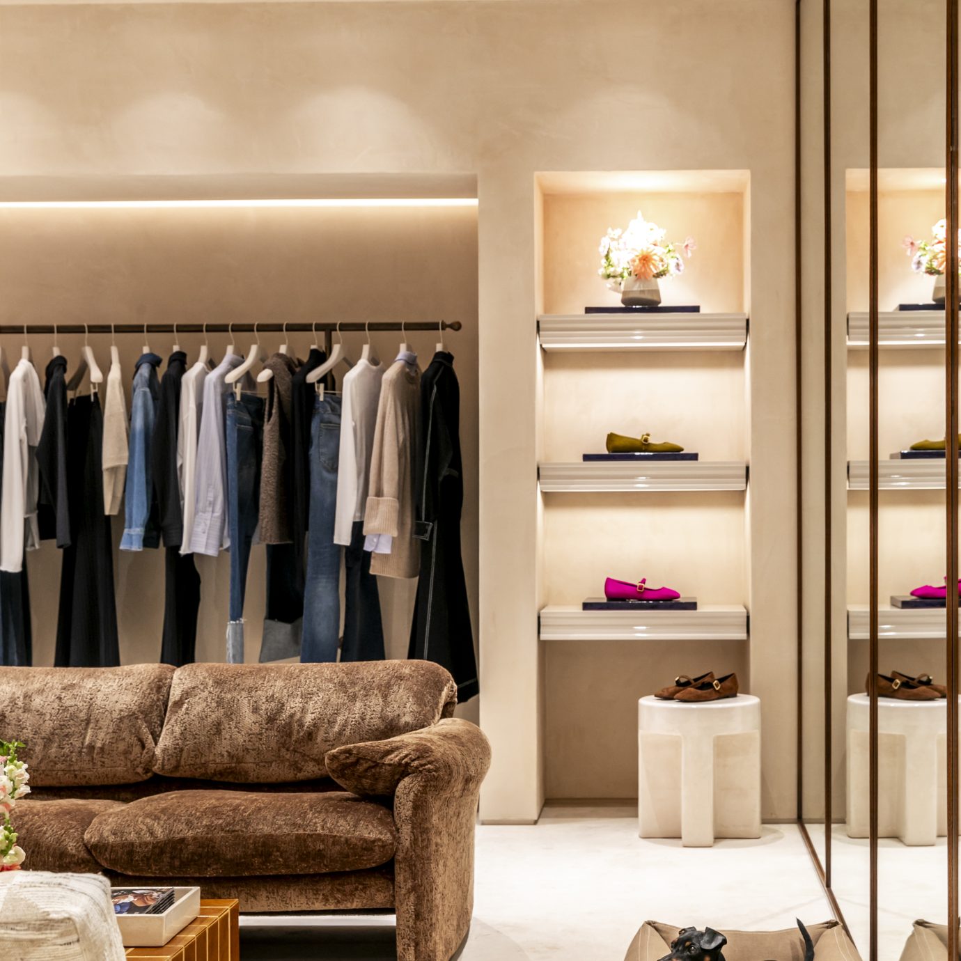 High-end clothing boutique interior for trying on and showcasing apparel and footwear.