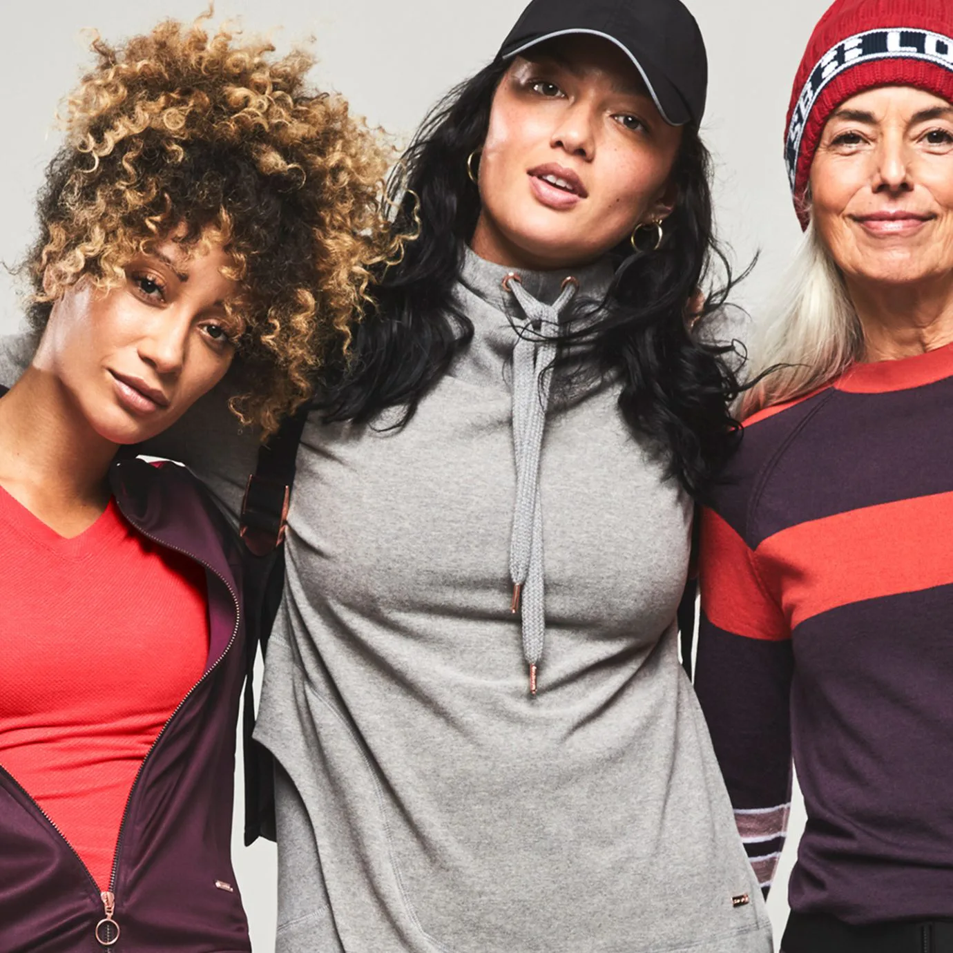 Three women modeling Sweaty Betty athletic apparel