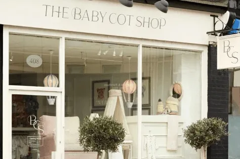 The Baby Cot Shop storefront, a retail nursery furniture store