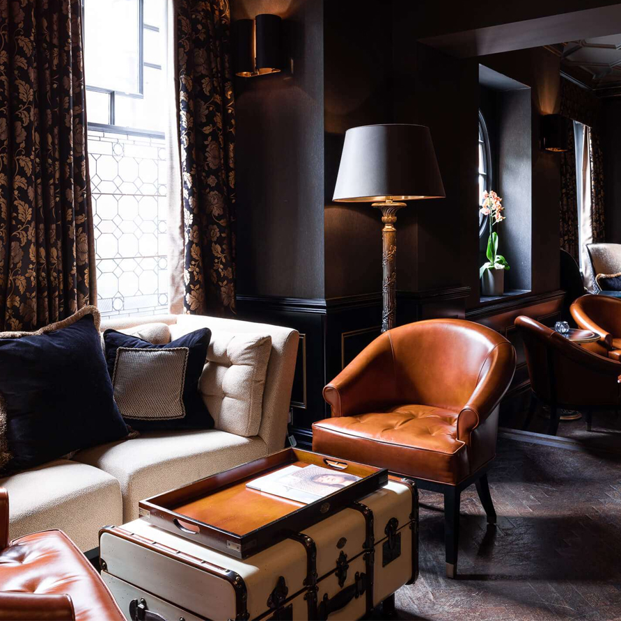 The Chelsea Bar lounge is an intimate, upscale seating area for relaxed drinks and conversation.