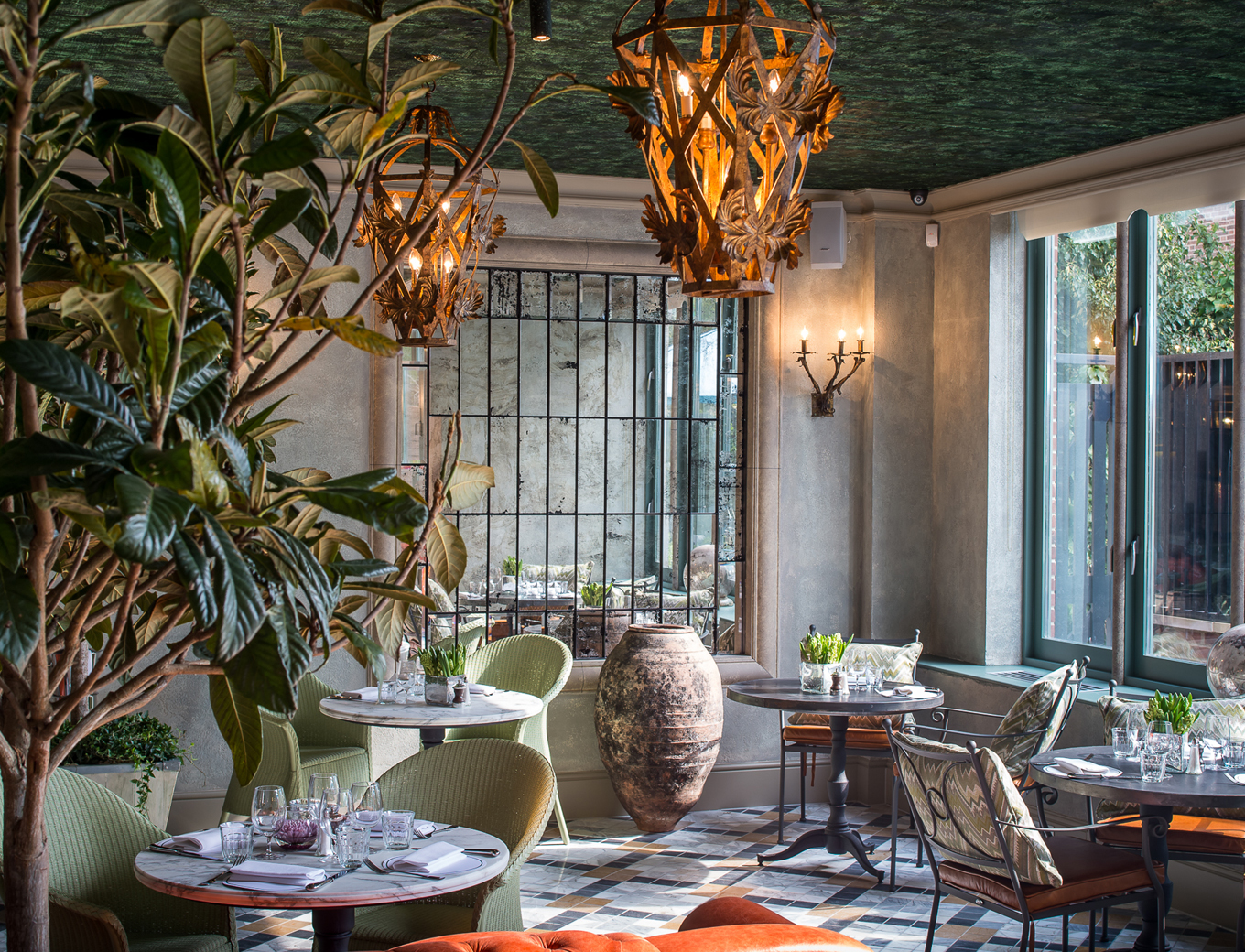 The Ivy Chelsea Garden dining room offering a relaxed, garden-inspired indoor dining setting.