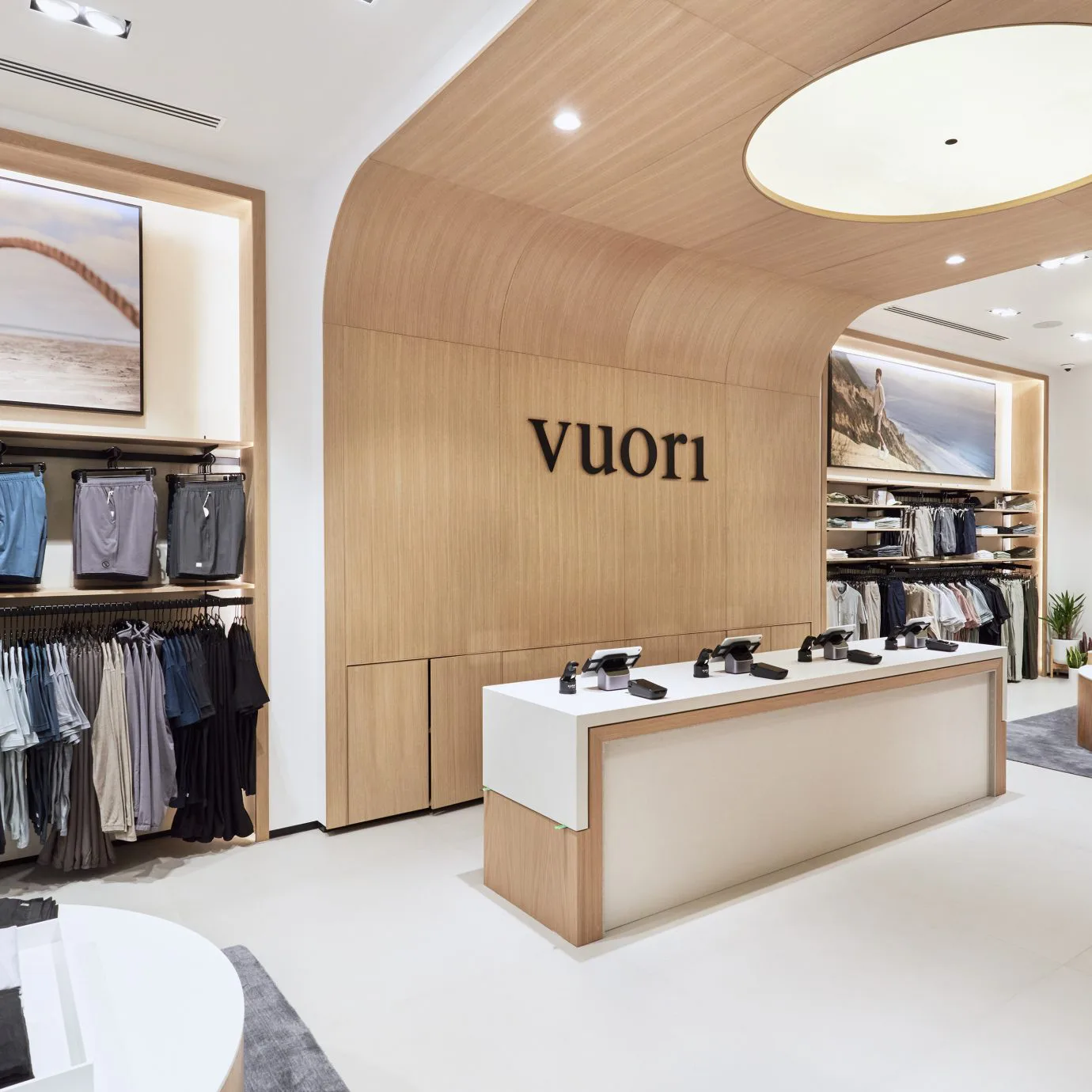 Vuori retail store interior with prominent brand logo and checkout counter