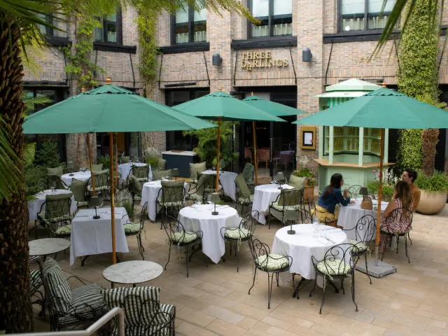 Three Darlings restaurant courtyard patio for outdoor dining