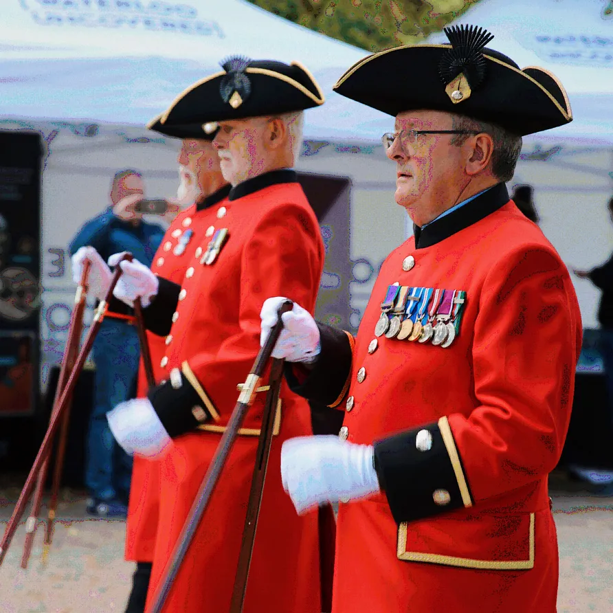 Chelsea Pensioners performing a ceremonial march at the Chelsea History Festival.