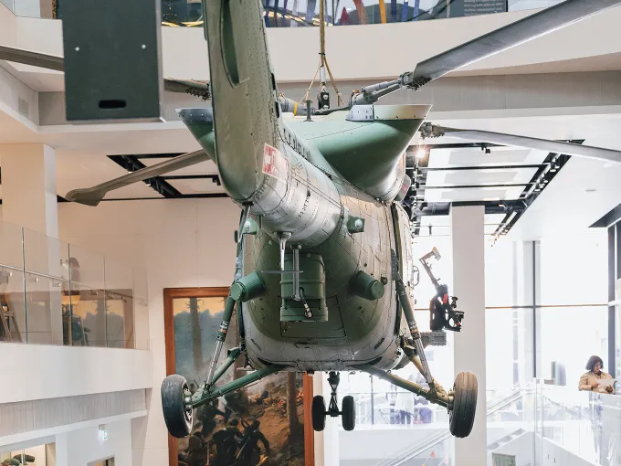 Military helicopter exhibit in a museum for family-friendly history and education