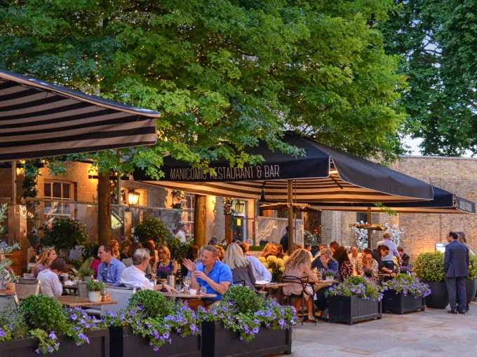 Outdoor family-friendly restaurant terrace for casual dining and socializing