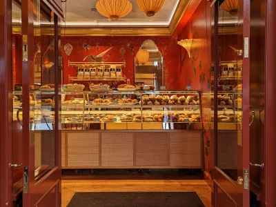 Chelsea bakery entrance showcasing fresh croissants and pastries for sale