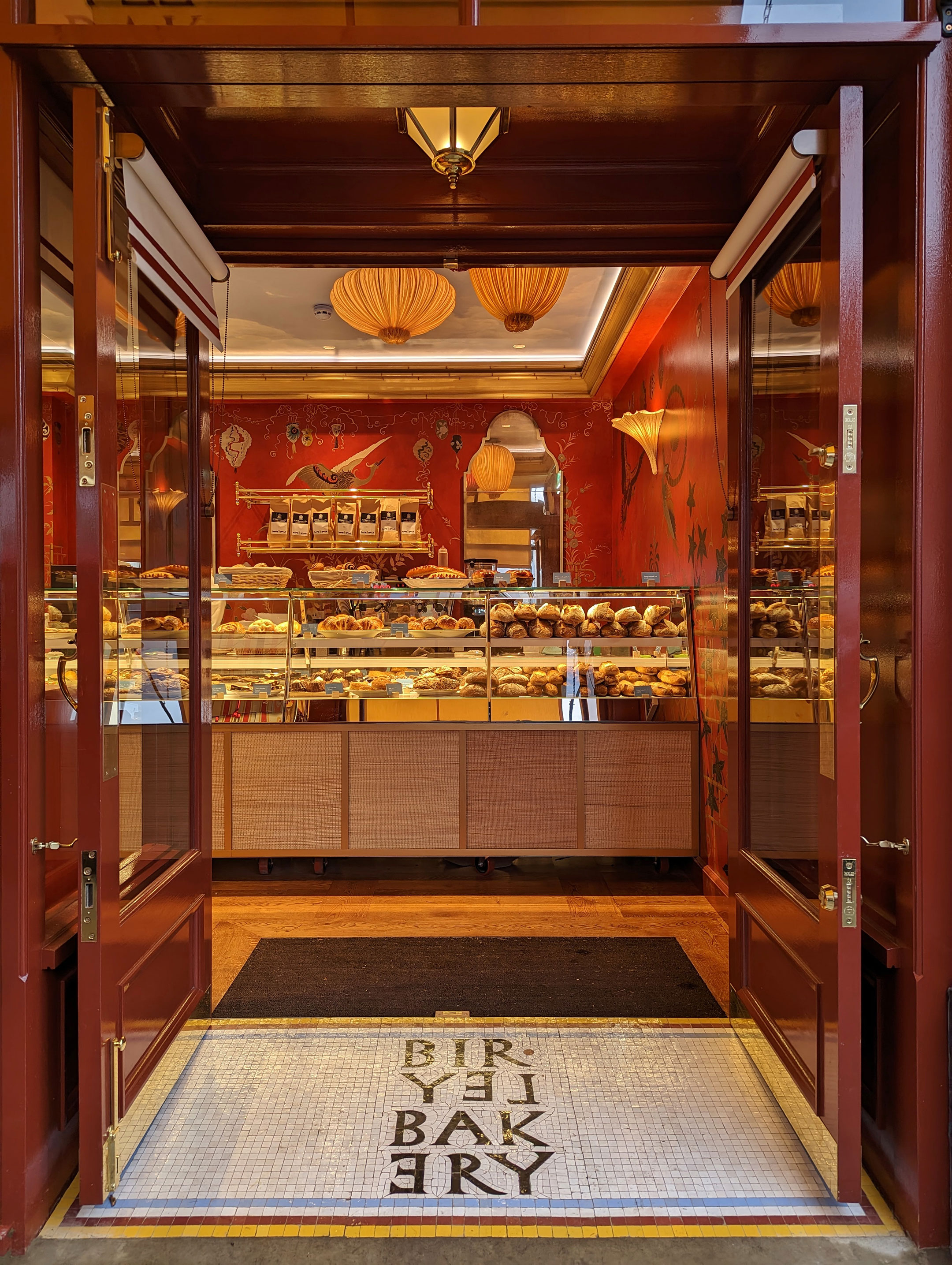 Chelsea bakery entrance showcasing fresh croissants and pastries for sale