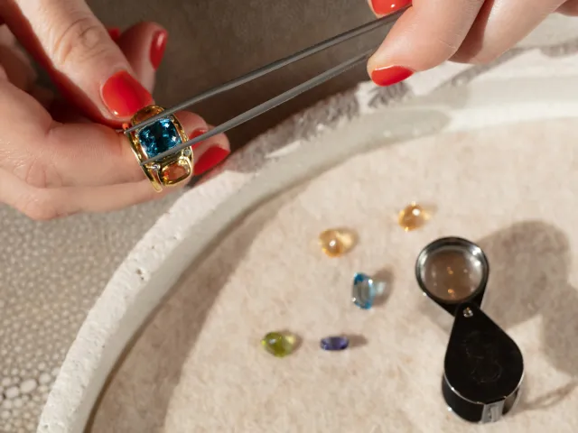Jeweler inspecting a ring for quality